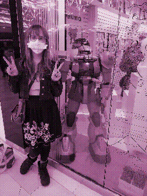 photo of emily in monochrome. It's low resolution with a dithering filter.